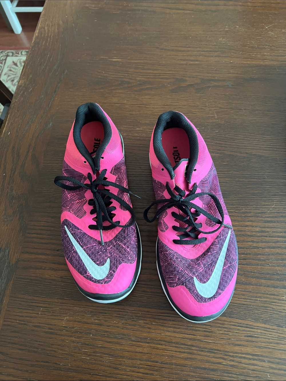 Nike Women's Pink and Black Athletic Running Shoes with White Swoosh